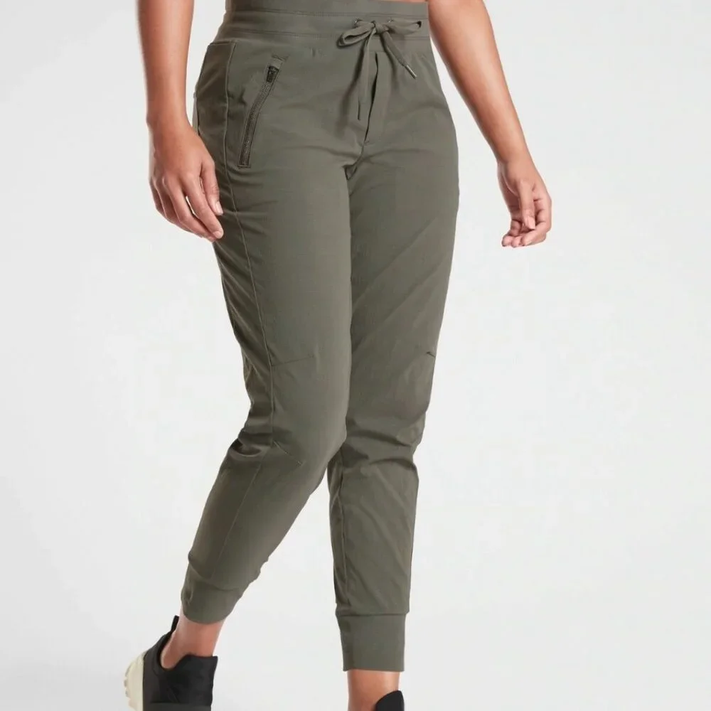 Athleta Trekkie North Jogger Olive Travel Athleisure Hi-Rise Zip Pkts Sz 16 - Picture 1 of 7
